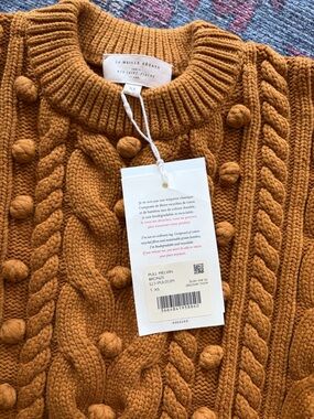Sezane mustard cable knit sweater with pom-pom details